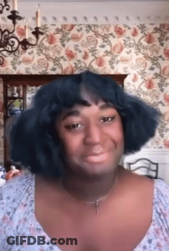Woman In Wheelchair In Crowd GIF