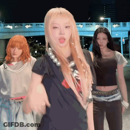 Woman In White Adidas Shirt In Front Of Mirror GIF