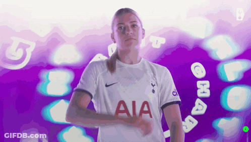 Woman In White AIA Shirt Purple Background GIF