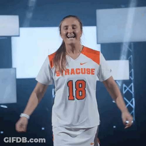 Woman In White And Orange Jersey Number 18 GIF