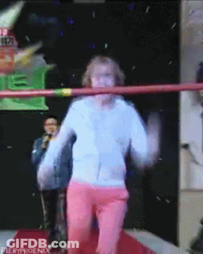 Woman In White And Pink Dancing In Fieryphoenix Ring GIF