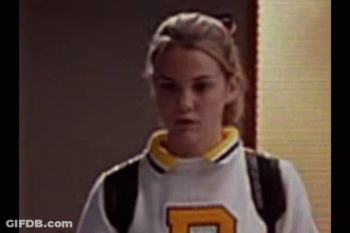 Woman In White And Yellow Jersey With Letter D GIF