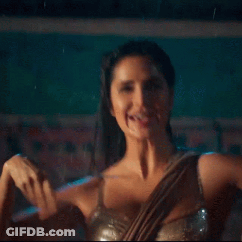 Woman In White Bra Standing In Rain GIF