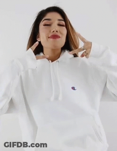 Woman In White Champion Hoodie Making Peace Sign GIF