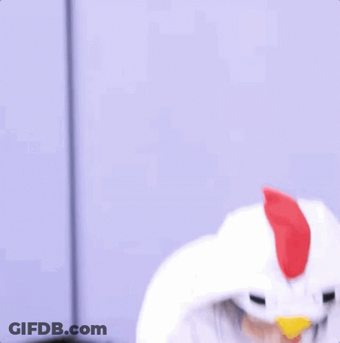 Woman In White Chicken Costume With Hood GIF