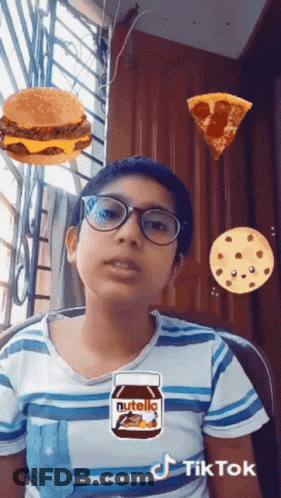 Woman In White Coat In Front Of Red Chair On NBC The Voice GIF