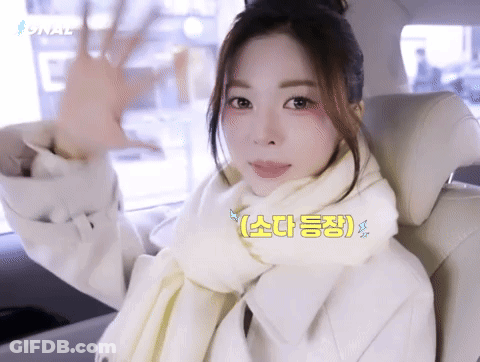 Woman In White Coat Sitting In Back Seat GIF
