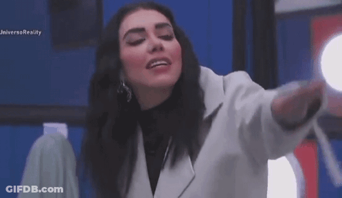 Woman In White Coat Smiling Arms Outstretched GIF