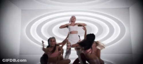 Woman In White Crop Top Surrounded By Women GIF