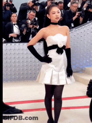 Woman In White Dress And Black Gloves GIF