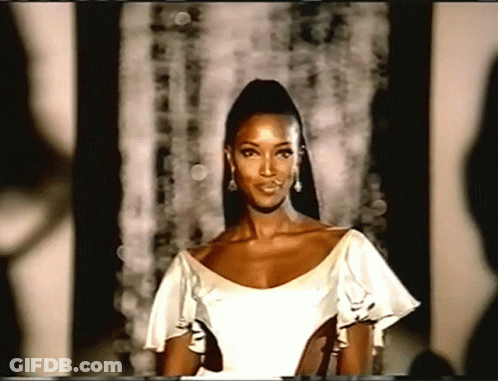 Woman In White Dress And Earrings GIF