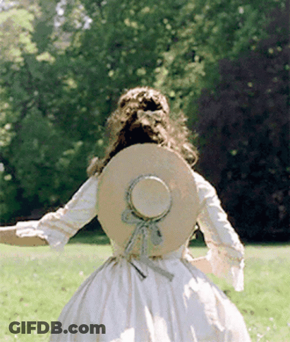 Woman In White Dress And Hat Running In Field GIF