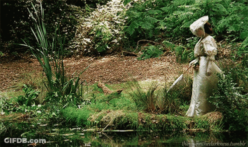 Woman In White Dress By River GIF
