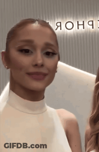 Woman In White Dress By Sign Saying Яоня GIF