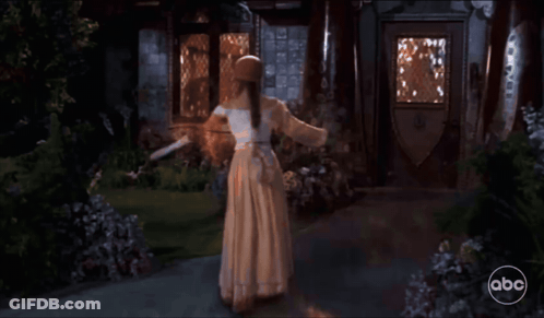 Woman In White Dress Dancing By House ABC GIF