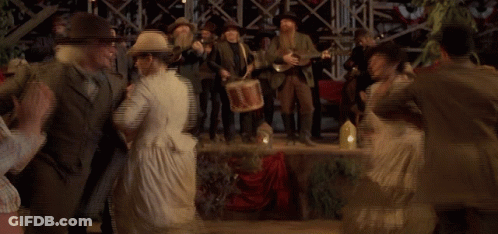 Woman In White Dress Dancing In Crowd GIF