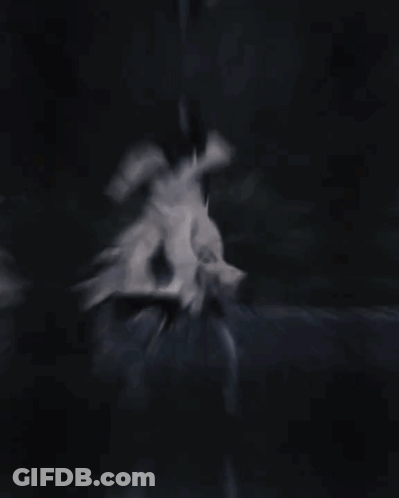 Woman In White Dress Dancing In Dark Forest GIF