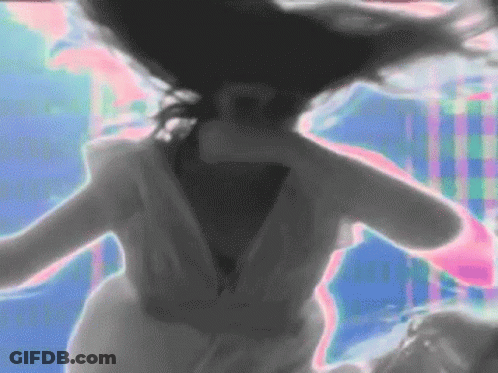 Woman In White Dress Dancing With Hair Flying GIF