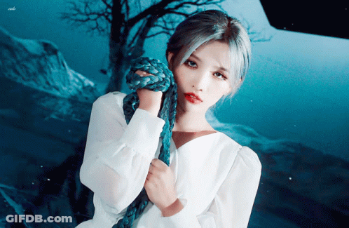 Woman In White Dress Holding Blue Rope GIF