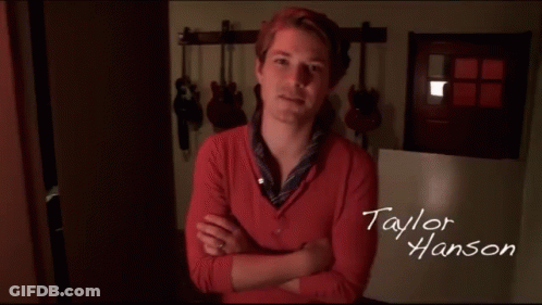 Woman In White Dress Holding Candle GIF