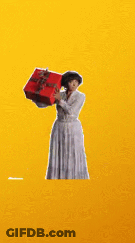 Woman In White Dress Holding Red Box On Yellow Background GIF
