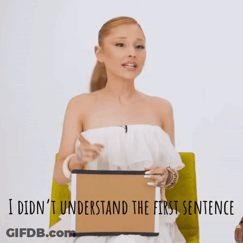 Woman In White Dress Holding Sign I Didn't Understand The First Sentence GIF