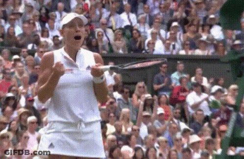 Woman In White Dress Holding Tennis Racket GIF