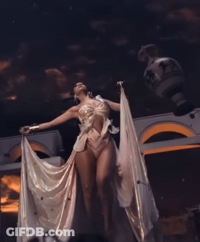 Woman In White Dress Holding White Cloth GIF