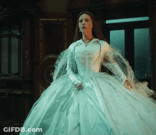 Woman In White Dress In Front Of Mirror GIF
