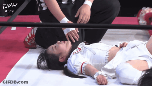 Woman In White Dress Laying In Wrestling Ring #TJPW GIF