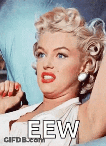 Woman In White Dress Laying On Bed Saying Eew GIF
