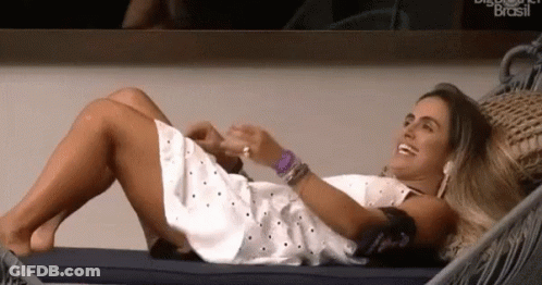 Woman In White Dress Lying In Hammock GIF