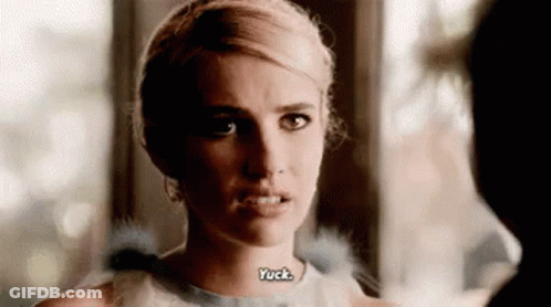 Woman In White Dress Making Funny Face GIF