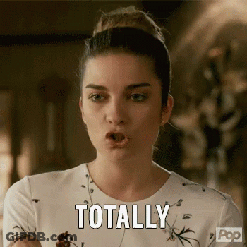 Woman In White Dress Making Funny Face Saying Totally GIF