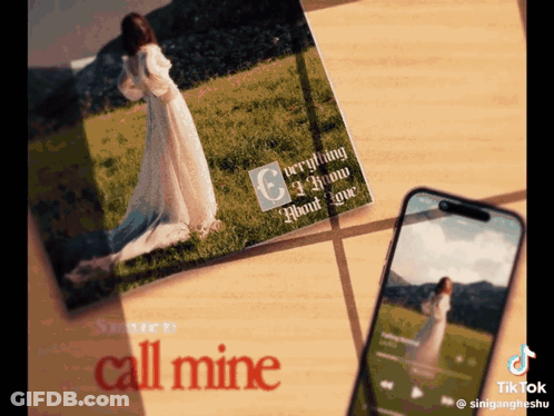 Woman In White Dress Next To Phone Saying Call Mine GIF