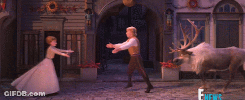 Woman In White Dress Next To Reindeer Saying E News GIF
