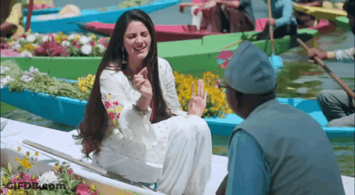 Woman In White Dress On Boat With Man GIF