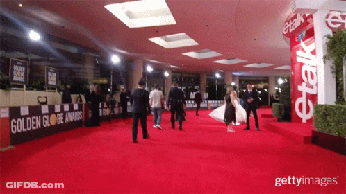 Woman In White Dress On Red Carpet Golden Globe Awards GIF