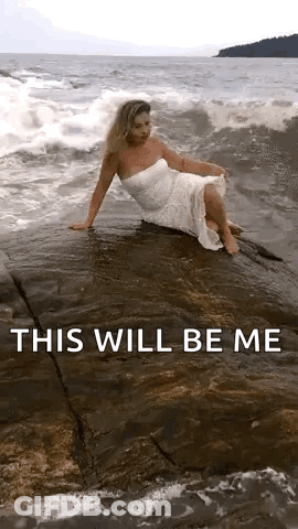 Woman In White Dress On Rock Saying This Will Be Me GIF