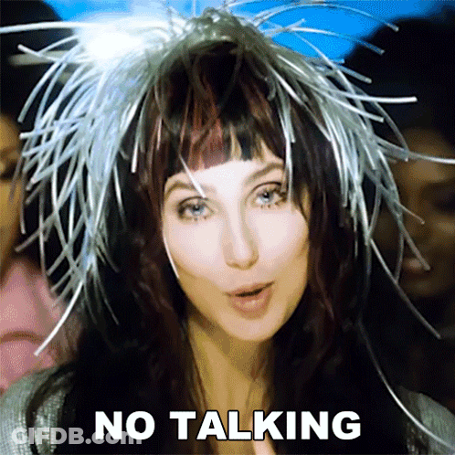 Woman In White Dress On Stage Before TV GIF