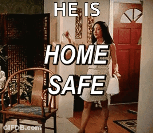 Woman In White Dress Saying He Is Home Safe GIF