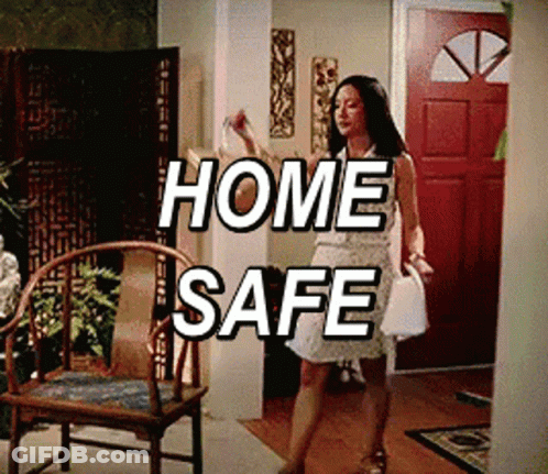 Woman In White Dress Saying Home Safe GIF