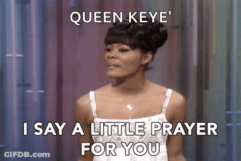 Woman In White Dress Saying Little Prayer GIF