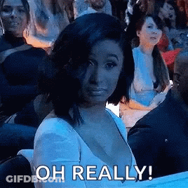 Woman In White Dress Saying Oh Really GIF