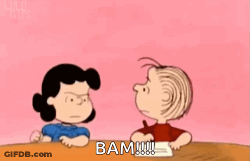 Woman In White Dress Says Bam By Chain Link Fence GIF