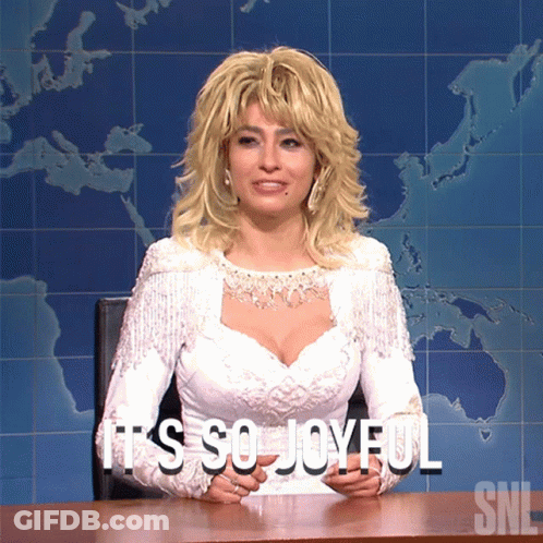 Woman In White Dress Says It's So Joyful On SNL GIF