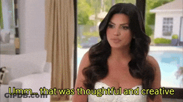 Woman In White Dress Says Umm Thoughtful And Creative GIF