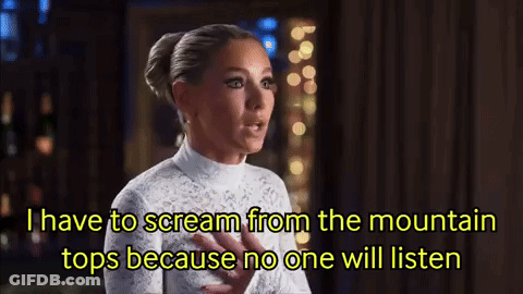 Woman In White Dress Screaming On Mountain Top GIF