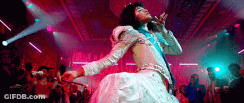 Woman In White Dress Singing Into Microphone GIF