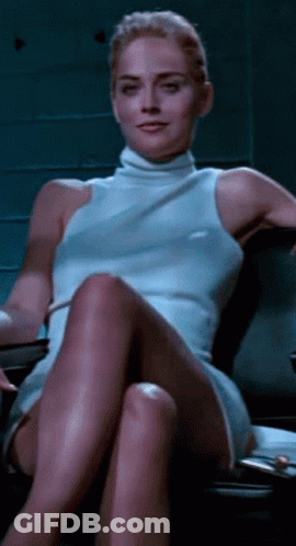 Woman In White Dress Sitting In Chair GIF